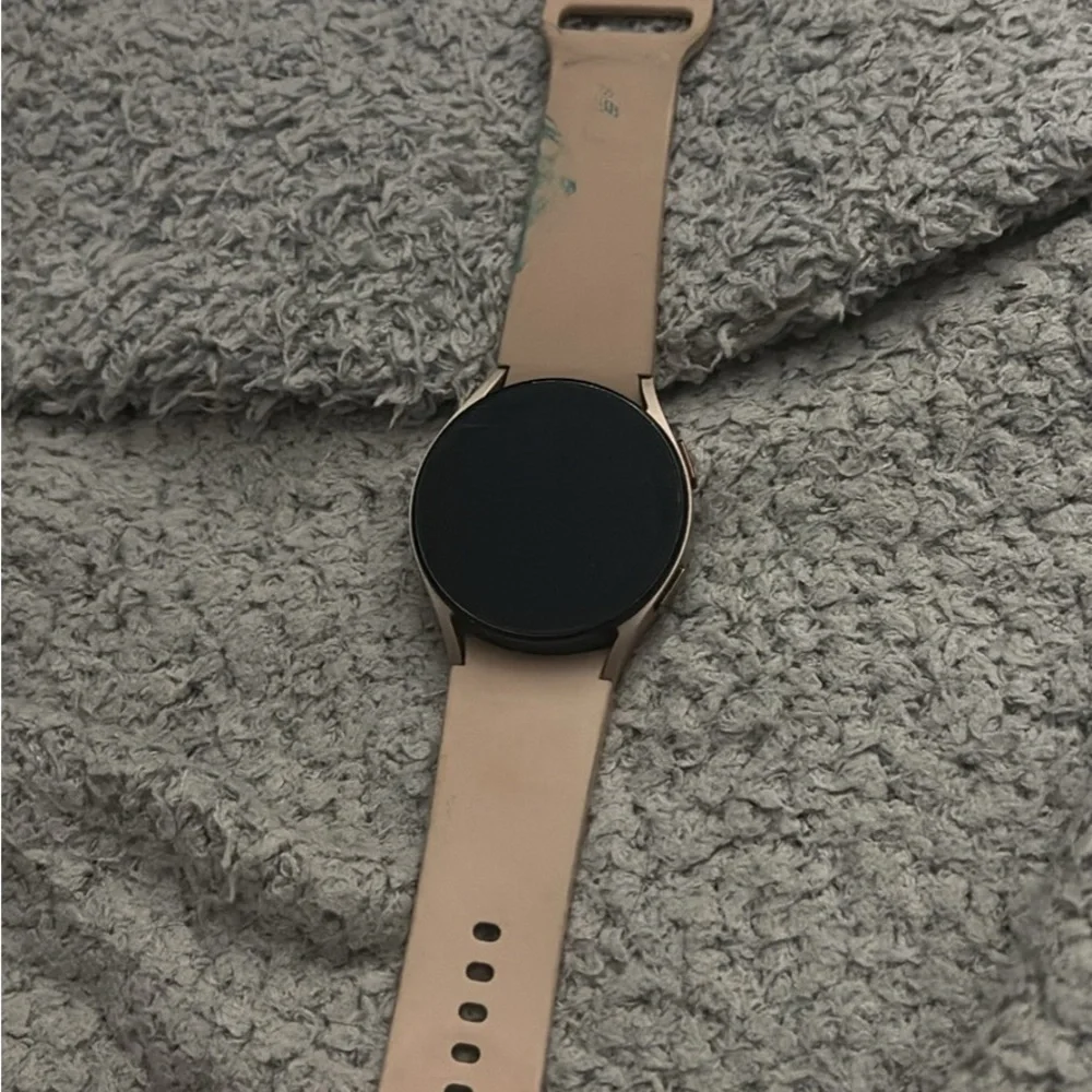 Samsung Smartwatch with Black Face and Tan Strap